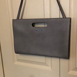 Michael Kors gray clutch with shoulder strap